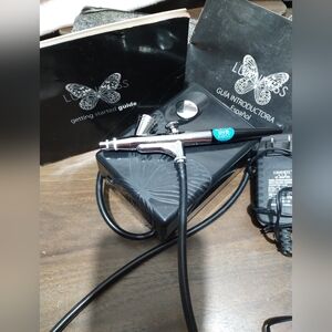 LUMINESS AIR--airbrush device, part of an airbrush makeup or skincare..